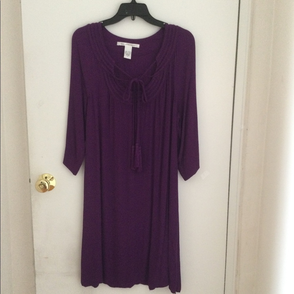 New , but open hem( see pic)